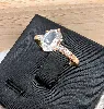 bague or centrée d'une aigue-marine épaulée de 2 petits diamants or 750 millième (18 ct) 1,74g