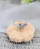 bague or blanc sertie de 3 pierres de couleur or 750 millième (18 ct) 1,57g