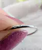 bague or blanc sertie de 3 pierres de couleur or 750 millième (18 ct) 1,57g