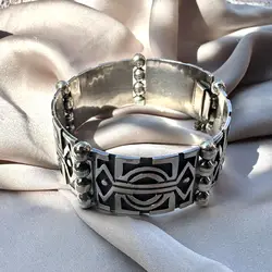 bracelet à larges maillons rectangulaires et motifs géométriques argent 925 millième (22 ct) 46,58 g