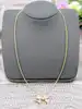 collier or avec un pendentif forme noeud papillon pavé de 84 diamants d'environ 1,8ct au total  or 750 millième (18 ct) 15,58g