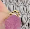 collier or avec un pendentif forme noeud papillon pavé de 84 diamants d'environ 1,8ct au total  or 750 millième (18 ct) 15,58g