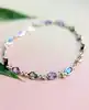 bracelet rivière serti des pierres de couleur or 750 millième (18 ct) 4,88g