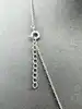 collier en argent avec pendentif en forme de noeud serti d'oxydes retenant une perle ronde argent 925 millième (22 ct) 2,92g
