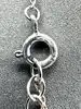 collier en argent avec pendentif en forme de noeud serti d'oxydes retenant une perle ronde argent 925 millième (22 ct) 2,92g