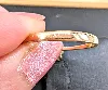 bague marguerite en or centrée d'un saphir entourné de 8 diamants taille brillant or 750 millième (18 ct) 2,07g