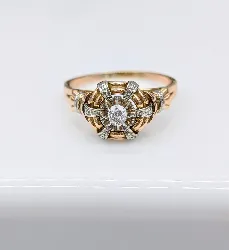 bague dôme en 2 ors centrée d'un diamant d'environ 0,08ct or 750 millième (18 ct) 4,42g