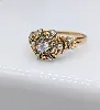 bague dôme en 2 ors centrée d'un diamant d'environ 0,08ct or 750 millième (18 ct) 4,42g