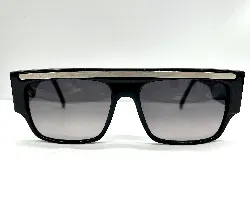 lunettes de soleil emmanuelle khanh 1000 gp avec des verres gris et la monture noir et argenté