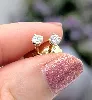 boucles d'oreilles en or blanc chacune sertie d'un diamant d'environ 0,10ct or 750 millième (18 ct) 1,31g