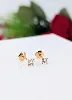 boucles d'oreilles puces en or chacune sertie d'un diamant d'environ 0,30ct or 750 millième (18 ct) 1,18g