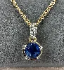 collier swarovski doré avec pendentif en cristal bleu