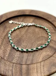87419218 bracelet rivière serti d'oxydes verts et incolores l18 cm argent 925 millième (22 ct) 2,5g
