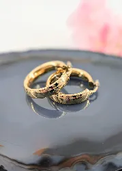 boucles d'oreilles créoles en or avec motifs or 750 millième (18 ct) 4,42g