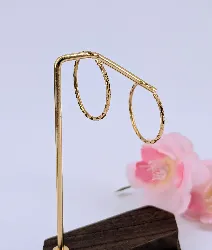boucles d'oreilles créoles en or motifs limés or 750 millième (18 ct) 4,11g