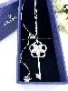 collier swarovski avec pendentif clé en cristaux et métal rhodié