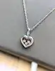 chopard collier happy damonds coeur en or blanc orné de 3 diamants or 750 millième (18 ct) 7,85g