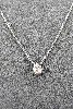 collier pendentif solitaire en or blanc orné d'un diamant taille brillant d'environ 0,50ct  or 750 millième (18 ct) 2,1g