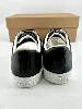 baskets / chaussures tennis chanel en cuir noir avec logo modèle uniform t46
