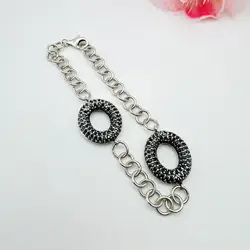 bracelet argent pendentifs ovales ornés de pierres noirs argent 925 millième (22 ct) 11,15g