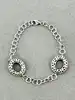bracelet argent pendentifs ovales ornés de pierres noirs argent 925 millième (22 ct) 11,15g