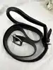 ceinture christian dior vintage en cuir noir avec boucle logo d argenté habillée de cuir, taille 85