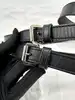 ceinture christian dior vintage en cuir noir avec boucle logo d argenté habillée de cuir, taille 85