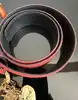ceinture vintage yves saint laurent en cuir suédé rouge avec pendentif soleil et coeur, boucle martelée dorée taille 85/34