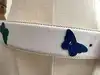 ceinture yves saint laurent en cuir blanc et papillons taille 85/34 référence 8966