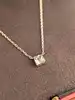 collier cartier collection tank en or blanc orné d'une aigue-marine facettée carrée or 750 millième (18 ct) 4,98g
