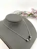 collier en argent ornée de trois perles noir argent 925 millième (22 ct) 5,69g