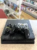 console sony playstation 4 ps4 slim 500go noire avec une manette