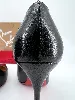 escarpins louboutin modèle decollete 554 en cuir noir