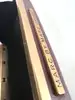 minaudière/pochette rigide marc by marc jacobs bordeaux avec chaîne dorée
