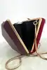 minaudière/pochette rigide marc by marc jacobs bordeaux avec chaîne dorée