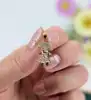 pendentif petite fille or 375 millième (9 ct) 0,34g