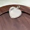 pendentif tiffany & co en forme de coeur  argent 925 millième (22 ct) 3,50g