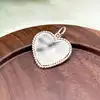 pendentif tiffany & co en forme de coeur  argent 925 millième (22 ct) 3,50g