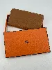 portefeuille hermès modèle silk'in classique en cuir marron, doublure en twill de soie