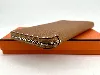 portefeuille hermès modèle silk'in classique en cuir marron, doublure en twill de soie