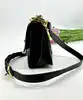 sac bandoulière sonia rykiel en cuir et tissu noir