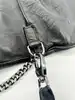sac bandoulière zadig et voltaire rock en cuir noir souple avec ailes cloutées