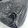 sac longchamp en cuir noir et détails argentés