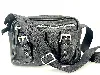 sac longchamp en cuir noir et détails argentés