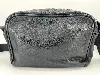 sac longchamp en cuir noir et détails argentés