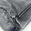 sac longchamp en cuir noir et détails argentés