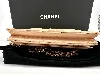 wallet on chain classique chanel en cuir beige rosé