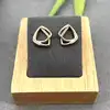 330347 boucles d'oreilles puces à forme géométique