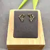 33794 boucles d'oreilles puces motif dauphin