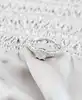 bague disque ornée de 7 diamants épaulée de 2 lignes de diamants or 375 millième (9 ct) 1,47g